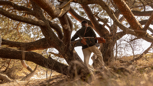 golfer walking with The Pine Sunday golf bag made from waxed canvas and leather by Pine Coast Golf